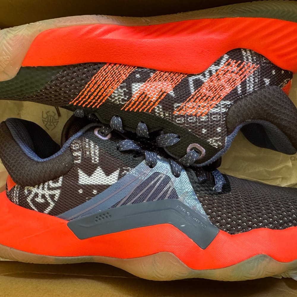 Adidas Black and Red Sneakers with Dynamic Design